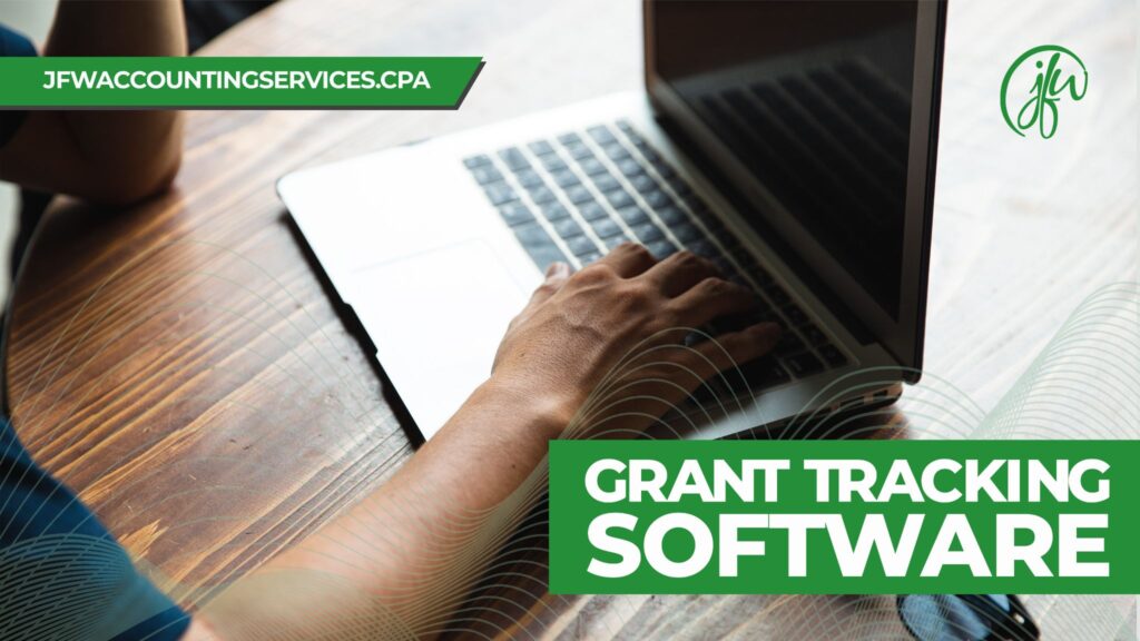 Nonprofit accounting staff using grant tracking software